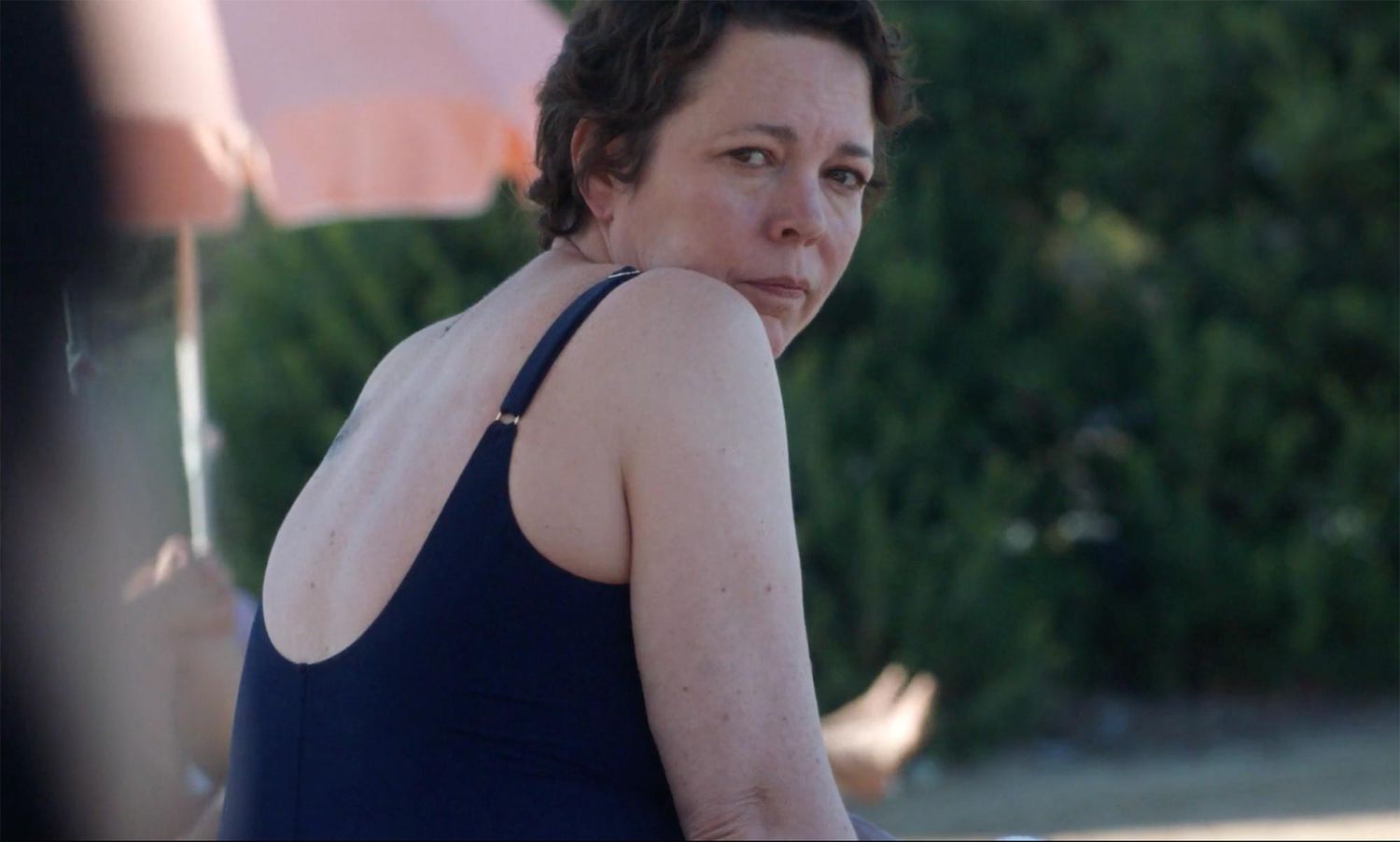 Olivia Coleman looks cold and grumpy